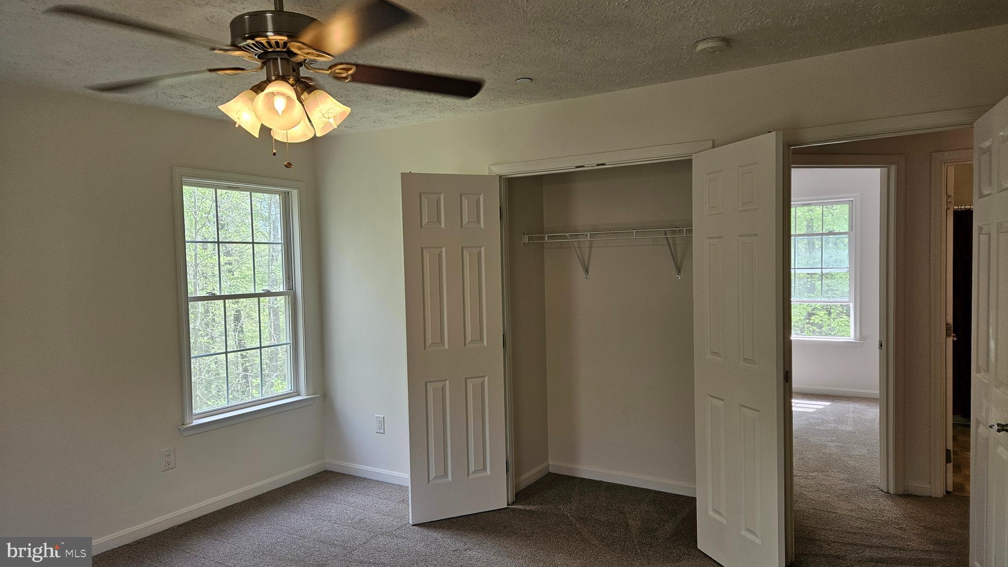 10495 Green Leaf Place La Plata, MD 20646 - Photo 19 of 24 a view of a livingroom with a window and a chandelier fan