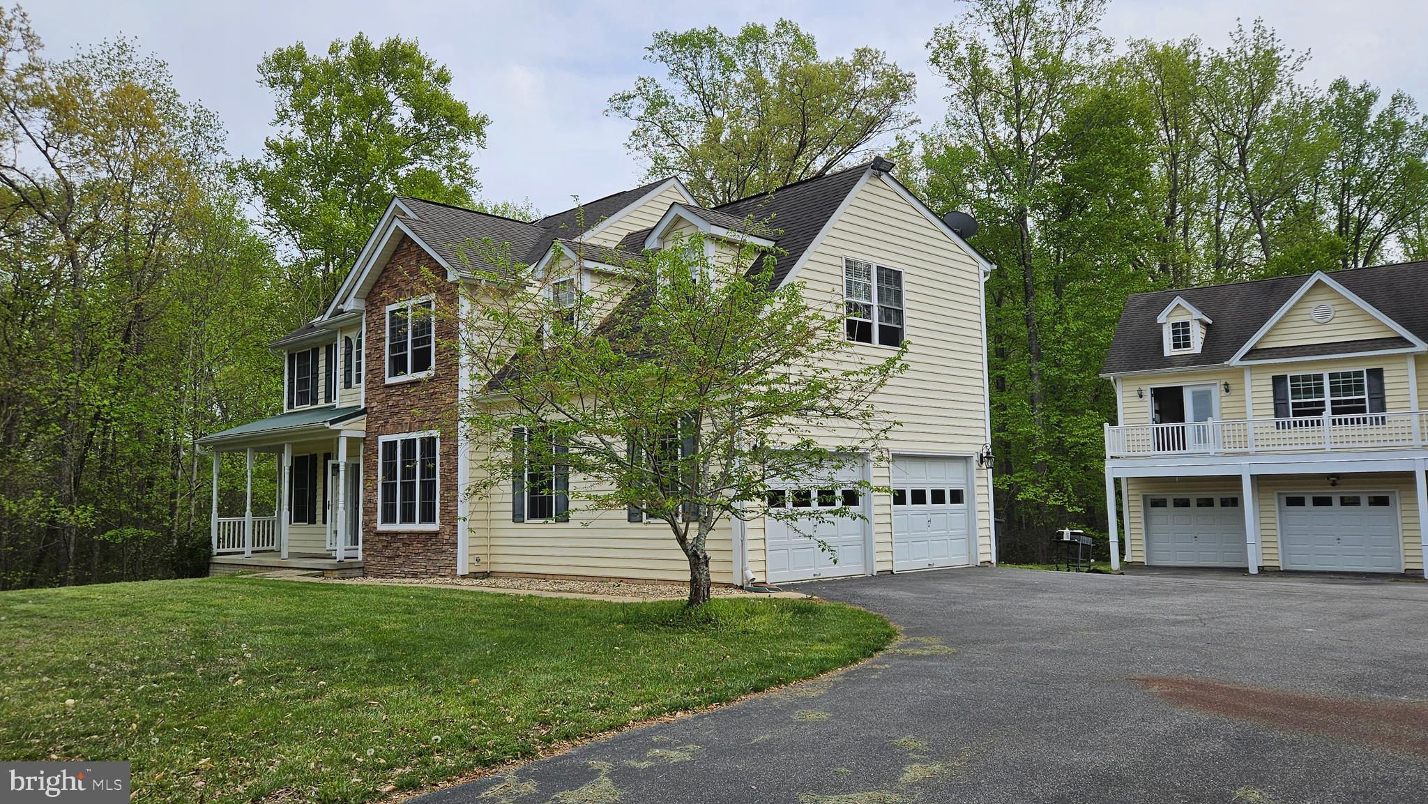 10495 Green Leaf Place La Plata, MD 20646 - Photo 2 of 24 a front view of a house with a garden