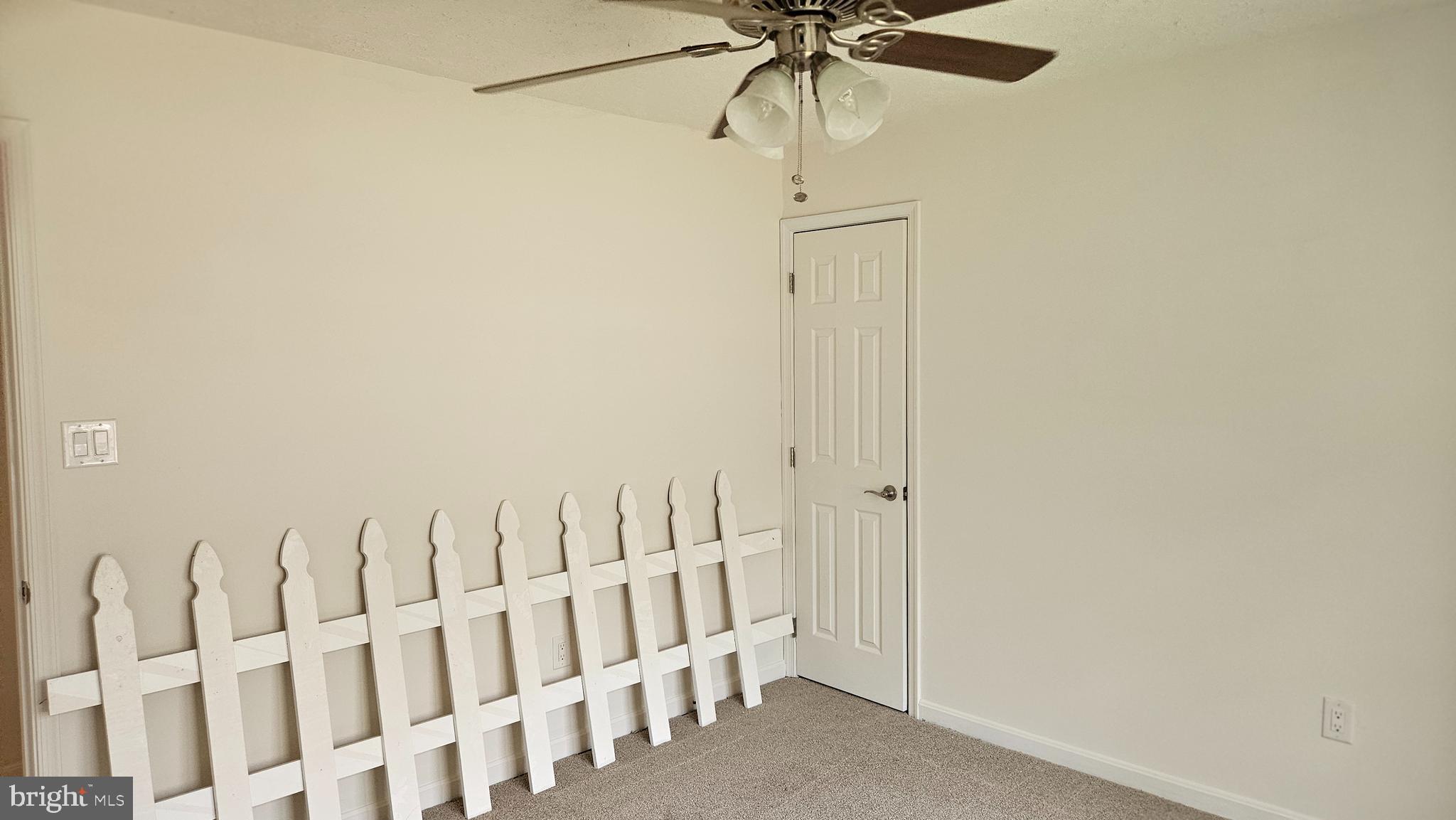 10495 Green Leaf Place La Plata, MD 20646 - Photo 21 of 24 a view of a room with wooden floor and a chandelier