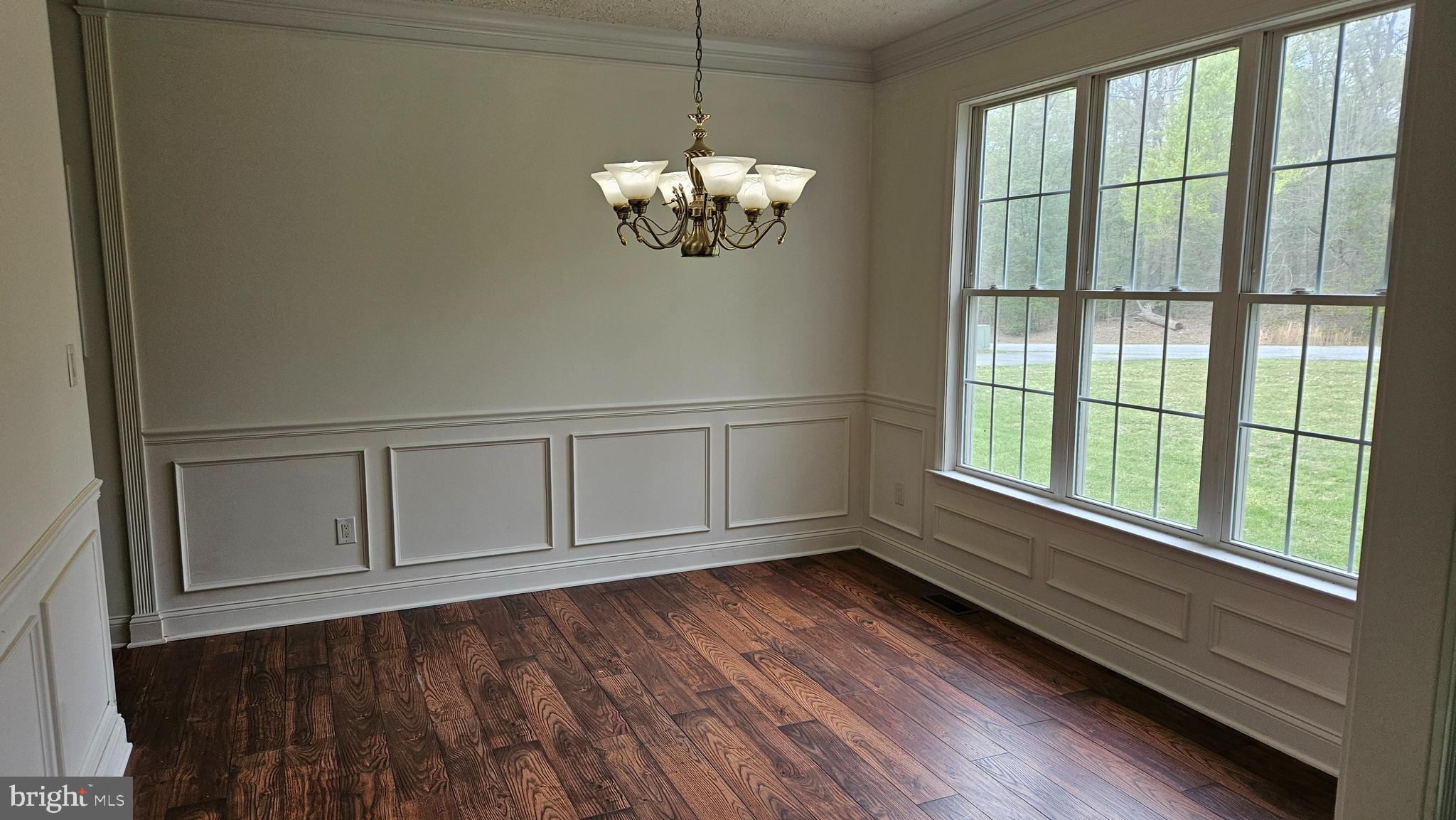 10495 Green Leaf Place La Plata, MD 20646 - Photo 5 of 24 a view of an empty room with a window and wooden floor