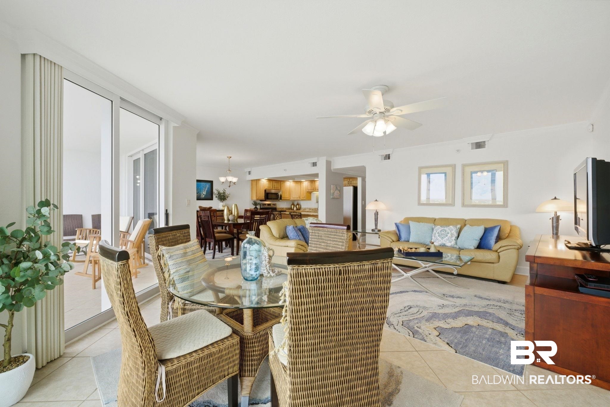 16284 Perdido Key Drive, Unit 912 Perdido Key, FL 32507 - Photo 15 of 49 Dining area featuring a ceiling fan and light tile patterned floors