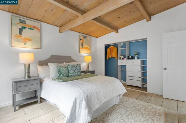 a view of a house with a yard and tree s