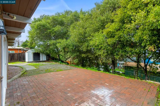 a view of a garden with a lake