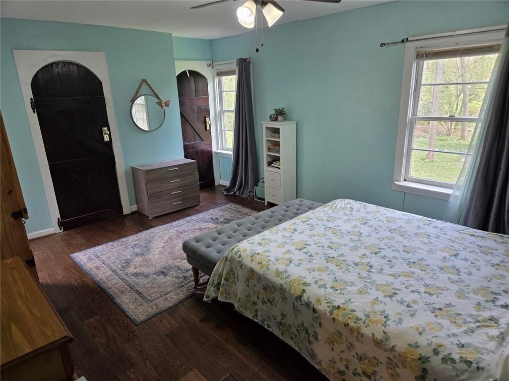 3790 Mauck Street Clarkston, GA 30021 - Photo 17 of 26 a bedroom with a bed and a dresser