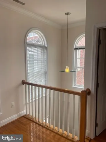 a large kitchen with stainless steel appliances granite countertop a sink a stove counter space and cabinets