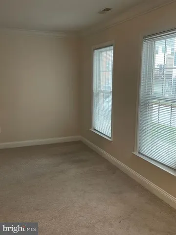 a bathroom with a toilet and a bathtub