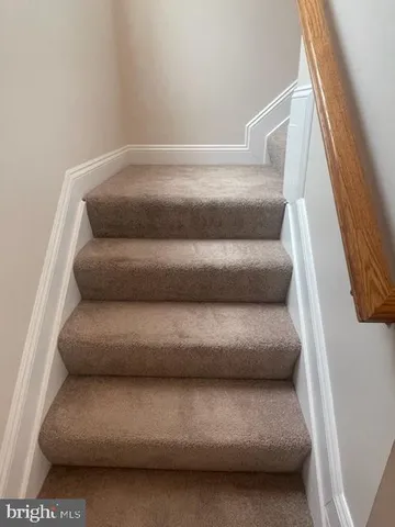 a front view of a house with swimming pool