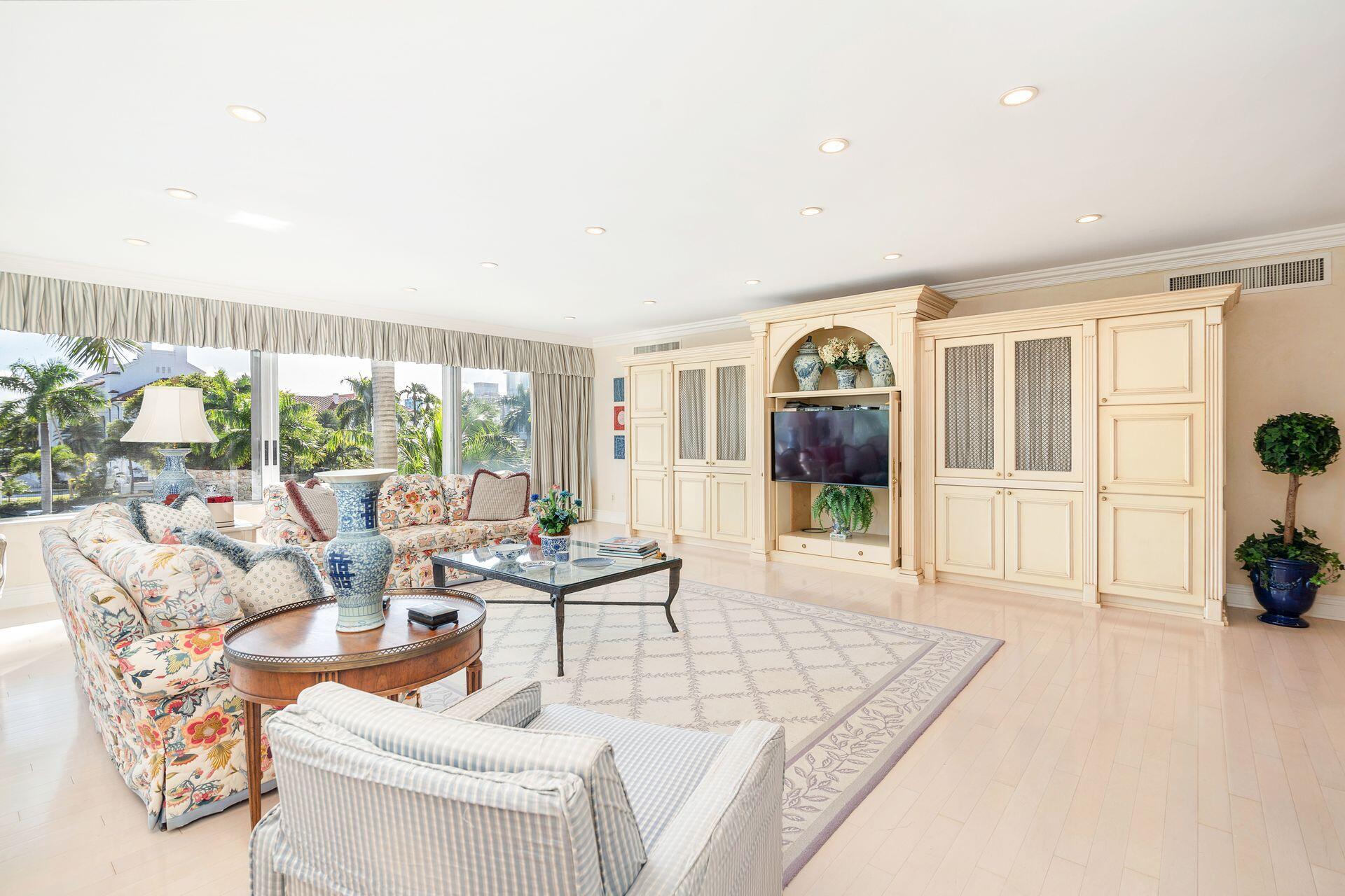 44 Cocoanut Row, Unit 227B Palm Beach, FL 33480 - Photo 5 of 28 a living room with furniture and a large window