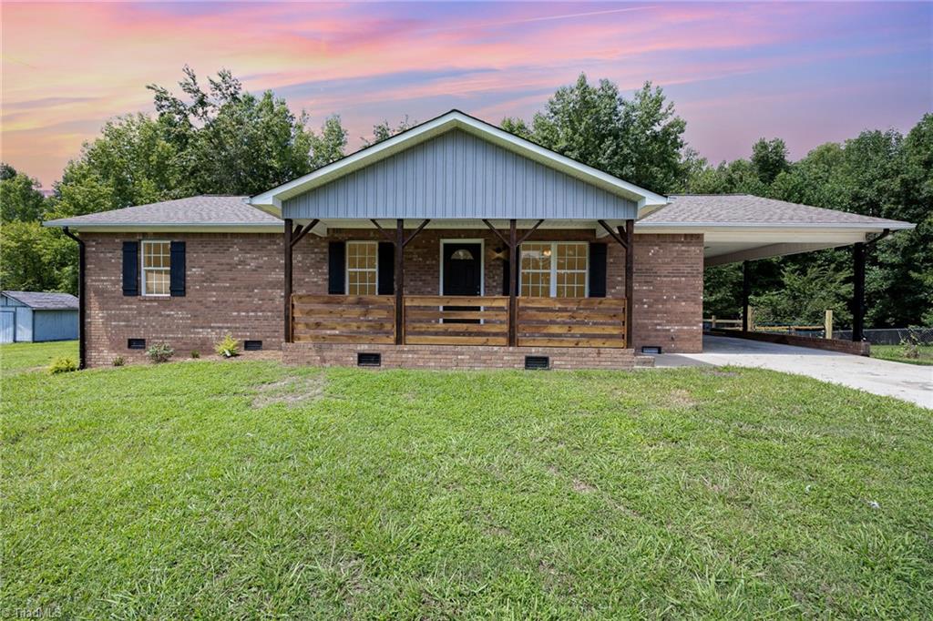 6563 Suits Road Archdale, NC 27263 - Photo 2 of 25 Covered front porch is awaiting your rocking chairs!