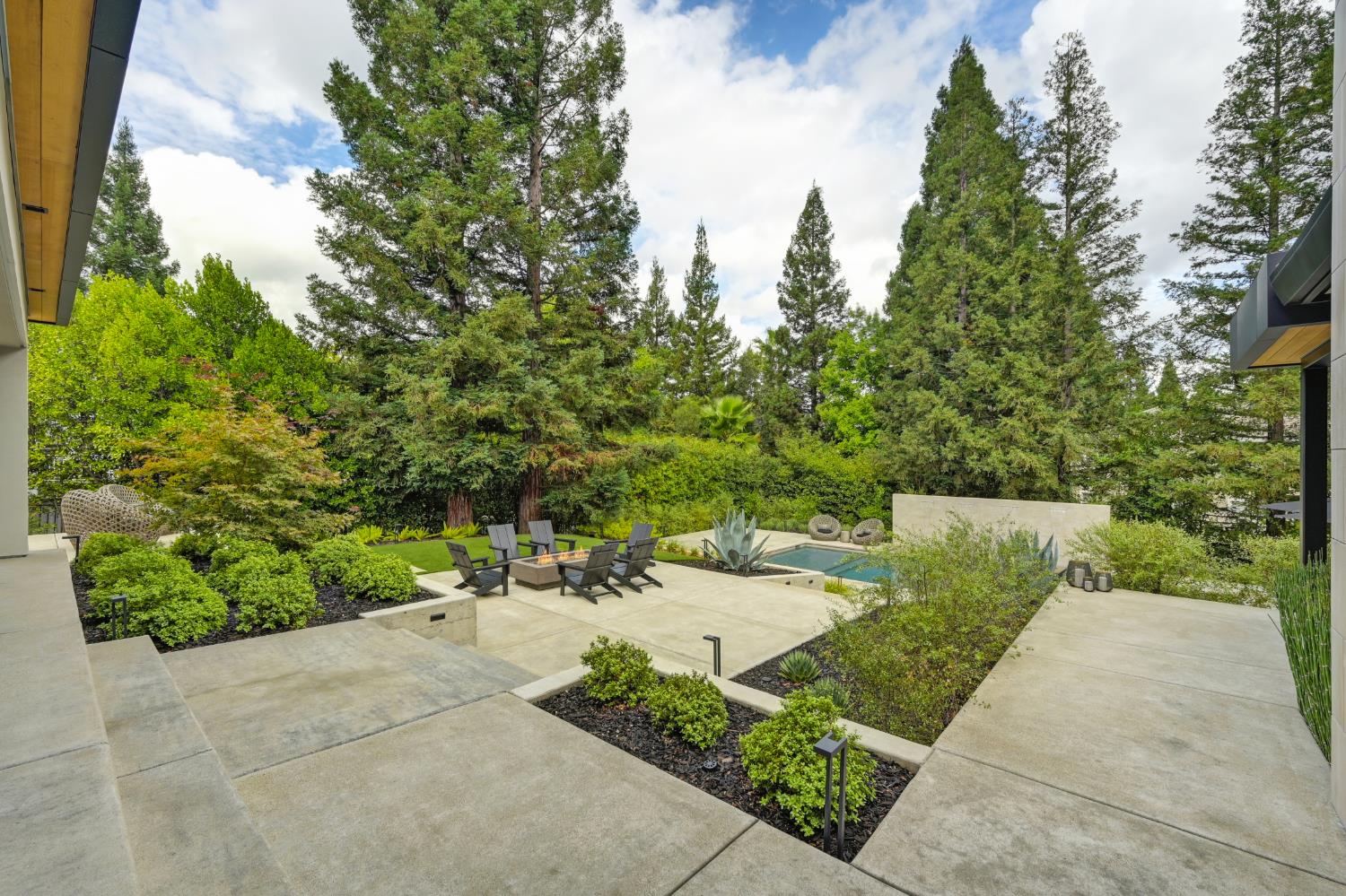 5020 Manchester Court Granite Bay, CA 95746 - Photo 63 of 95 a view of a park with potted plants and a bench