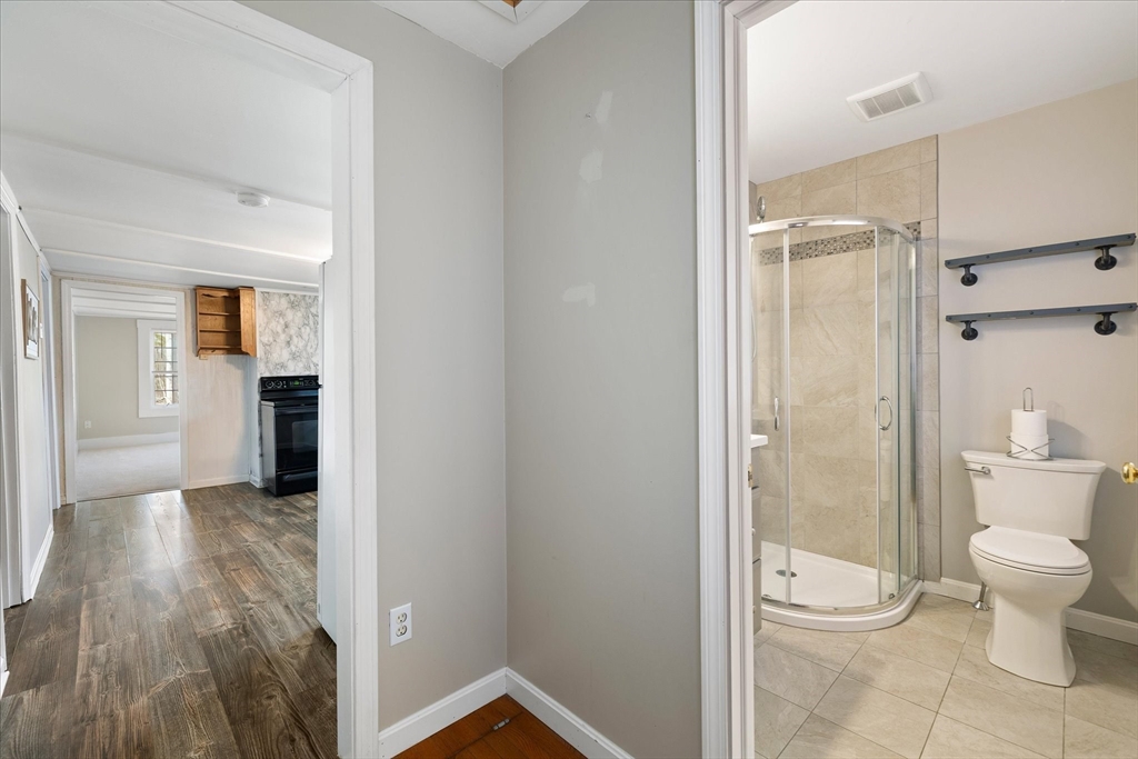 113 Baldwinville Road Templeton, MA 01468 - Photo 13 of 24 a bathroom with a shower toilet and sink