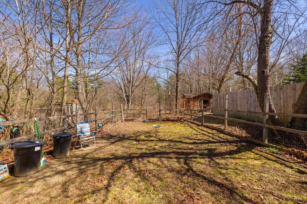 113 Baldwinville Road Templeton, MA 01468 - Photo 24 of 24 a view of a yard with snow on the road