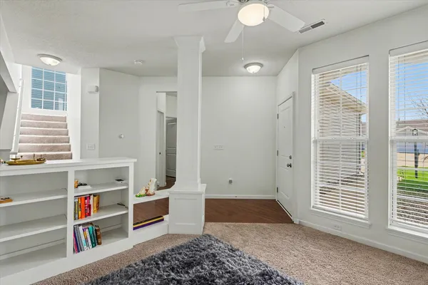 a view of livingroom with furniture and window