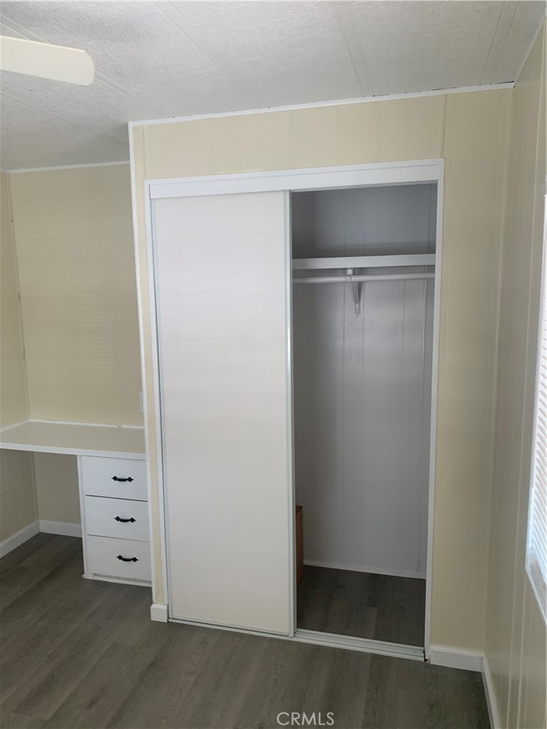 2865 West Rialto Avenue, Unit 2 Rialto, CA 92376 - Photo 13 of 19 a view of walk in closet with empty racks