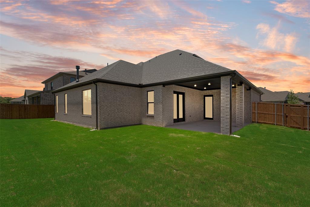 1327 Selby Road Van Alstyne, TX 75495 - Photo 38 of 38 a backyard of a house with lots of green space