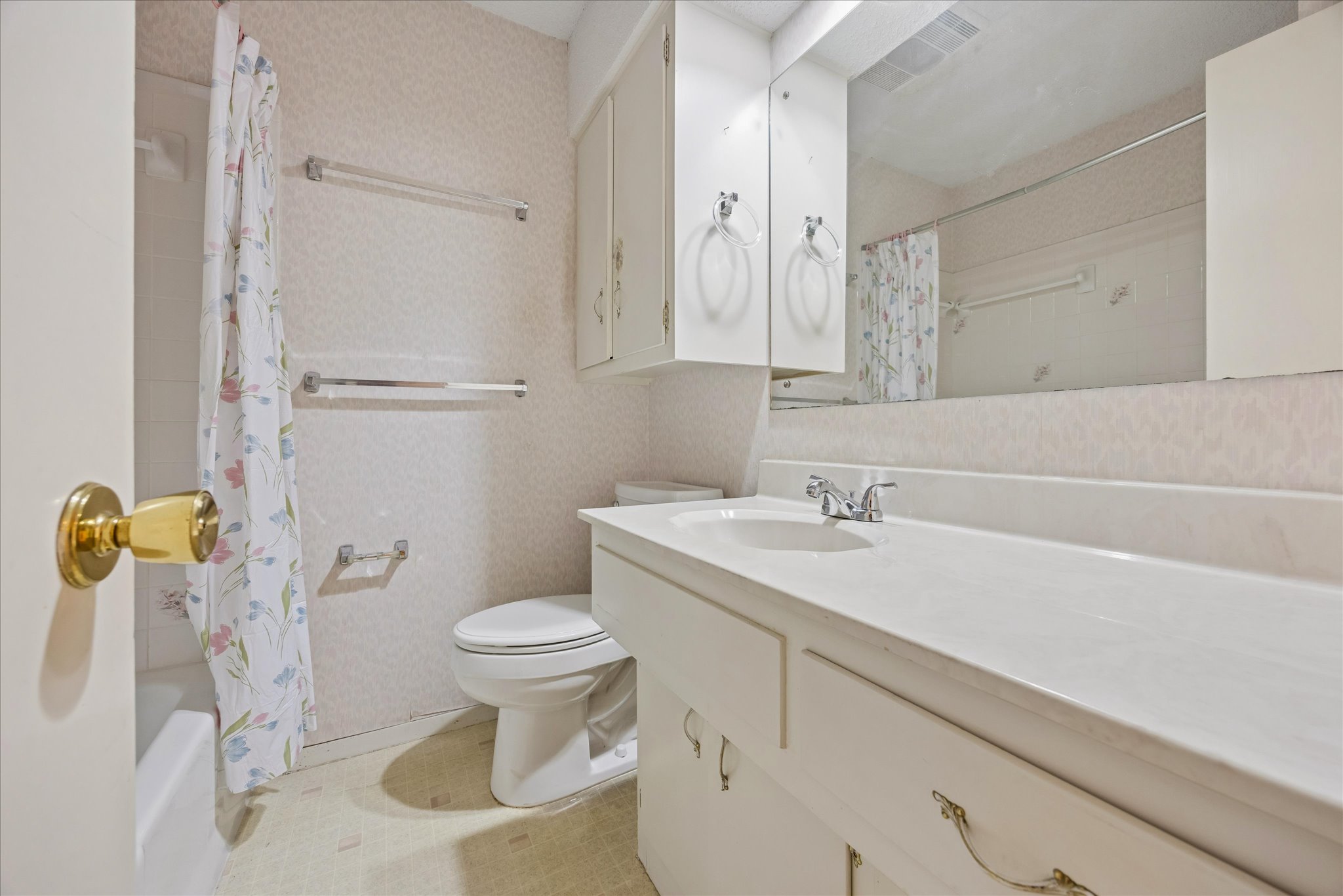 1815 Parkside Lane Austin, TX 78745 - Photo 11 of 28 a bathroom with a sink toilet and shower