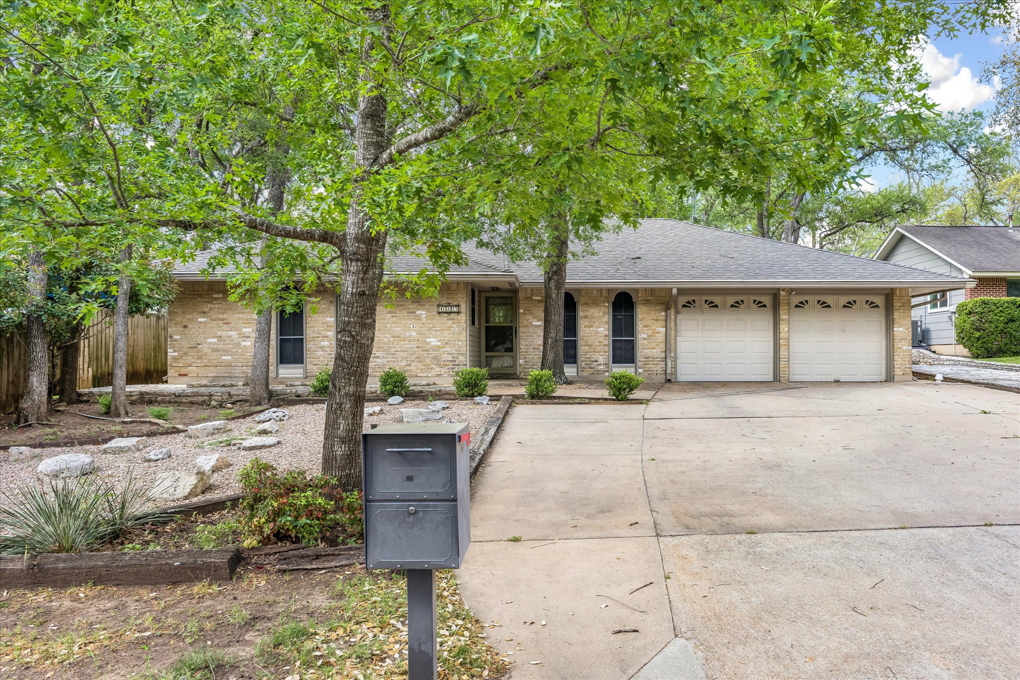1815 Parkside Lane Austin, TX 78745 - Photo 28 of 28 a house view with a sitting space and garden