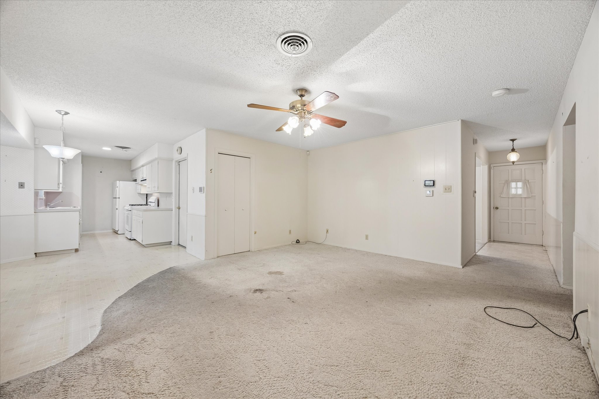 1815 Parkside Lane Austin, TX 78745 - Photo 5 of 28 an empty room with a bathroom and a shower