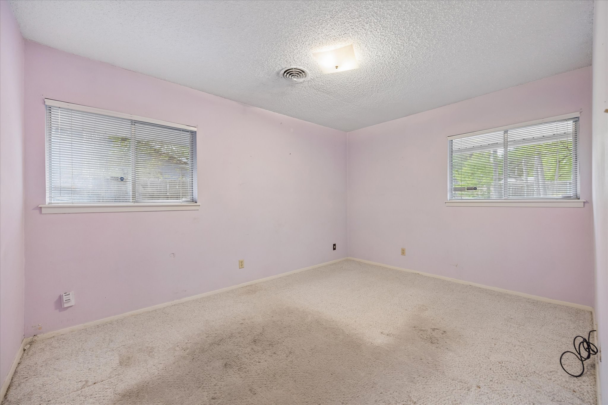 1815 Parkside Lane Austin, TX 78745 - Photo 10 of 28 a view of an empty room with a window