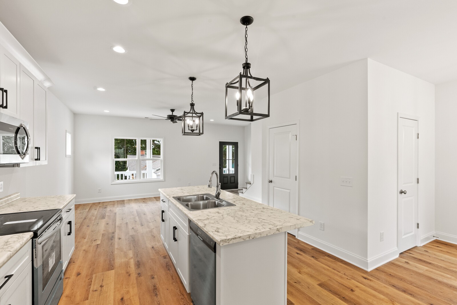 106 North Walnut Street Springfield, TN 37172 - Photo 7 of 14 a open kitchen with stainless steel appliances granite countertop stove and refrigerator