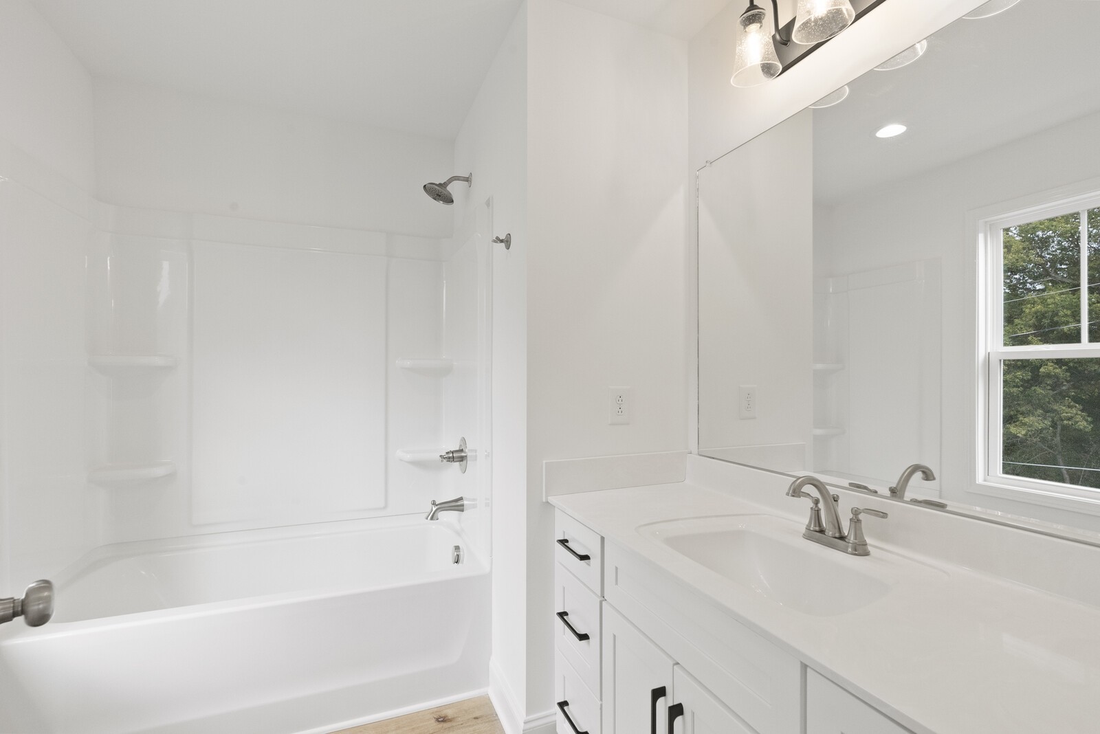 106 North Walnut Street Springfield, TN 37172 - Photo 10 of 14 a white bath tub sitting next to a white sink