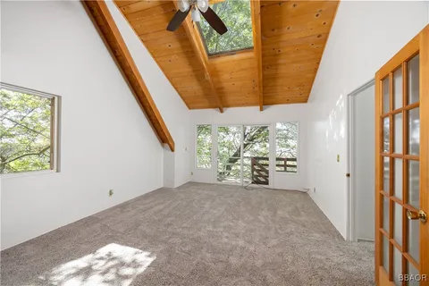 a view of a room with a large window