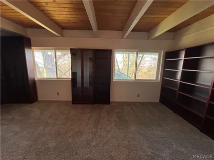 an empty room with windows