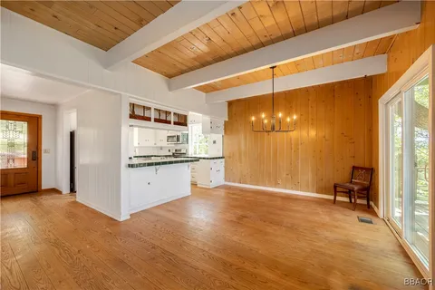 a view of a kitchen with furniture and a kitchen