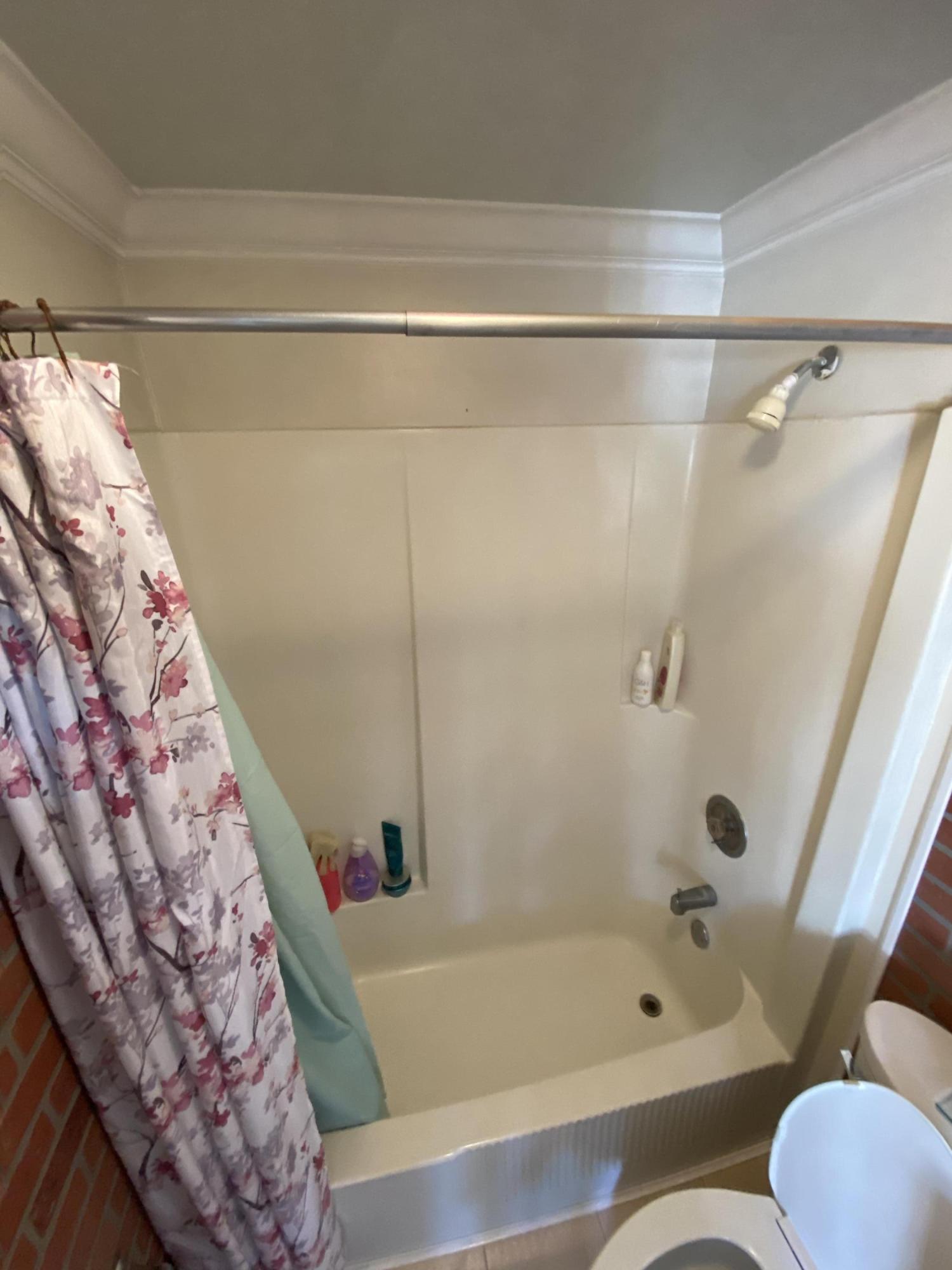 927 Catherine Street Key West, FL 33040 - Photo 25 of 29 a bathroom with a bathtub and a shower