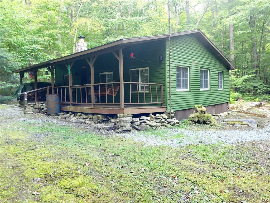 162 Rock Run Road Rector, PA 15677 - Photo 1 of 24 The front of the building showing the large front porch to relax on the swing