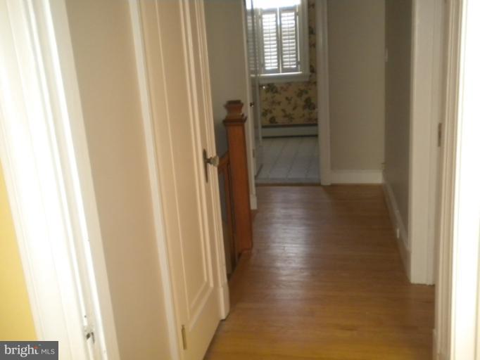 305 Hopkins Road Baltimore, MD 21212 - Photo 22 of 30 a view of a bathroom from a hallway