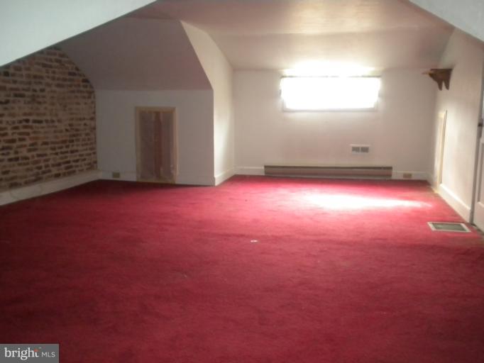 305 Hopkins Road Baltimore, MD 21212 - Photo 24 of 30 an empty room with windows