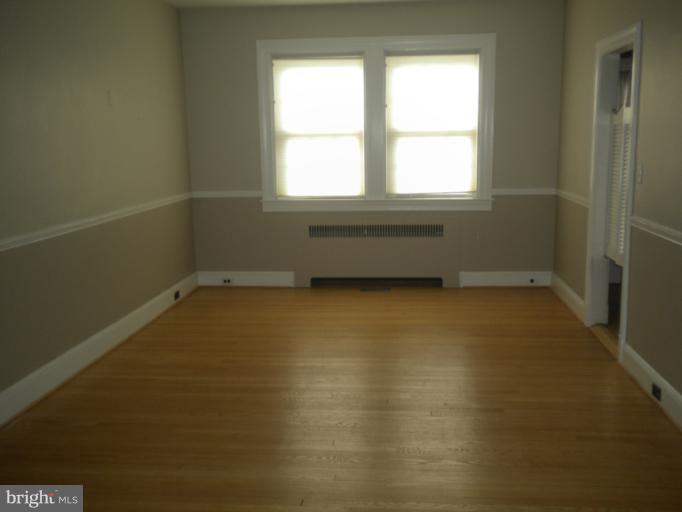 305 Hopkins Road Baltimore, MD 21212 - Photo 8 of 30 an empty room with a empty space and a window