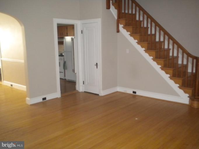 305 Hopkins Road Baltimore, MD 21212 - Photo 9 of 30 a view of an empty room with stairs