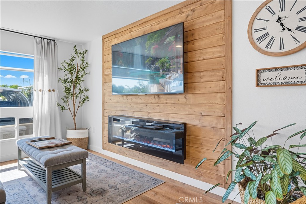 1120 East Mission Road, Unit 33 Fallbrook, CA 92028 - Photo 11 of 47 a living room with furniture and a fireplace