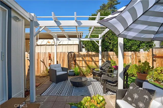 a view of a house with a tree