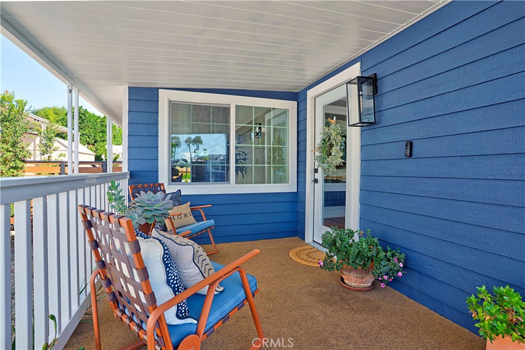 1120 East Mission Road, Unit 33 Fallbrook, CA 92028 - Photo 3 of 47 a view of a house with patio