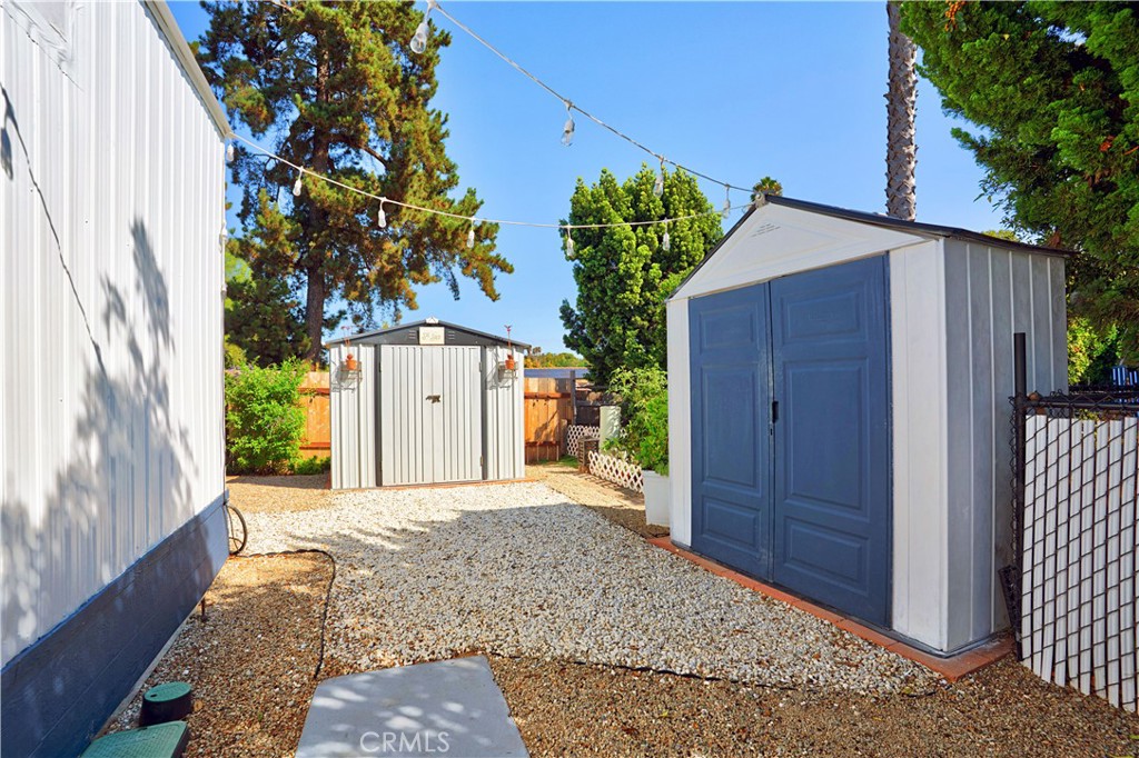 1120 East Mission Road, Unit 33 Fallbrook, CA 92028 - Photo 40 of 47 a view of a small space with wooden fence