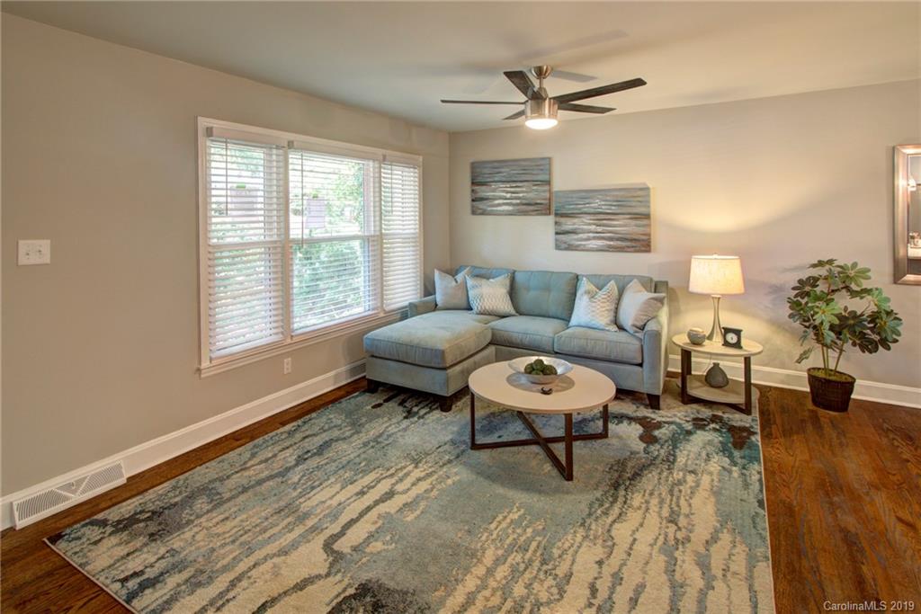 7439 Watercrest Road Charlotte, NC 28210 - Photo 13 of 28 a living room with furniture and a large window