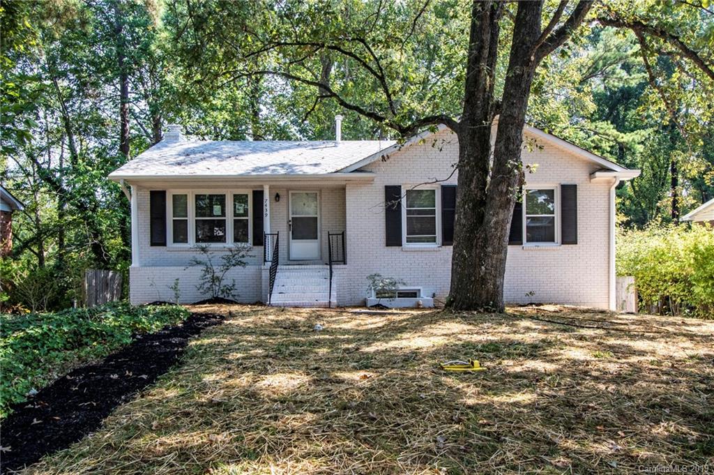 7439 Watercrest Road Charlotte, NC 28210 - Photo 3 of 28 a view of a house with a yard