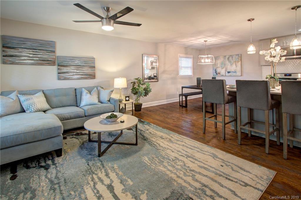 7439 Watercrest Road Charlotte, NC 28210 - Photo 6 of 28 a living room with furniture and wooden floor