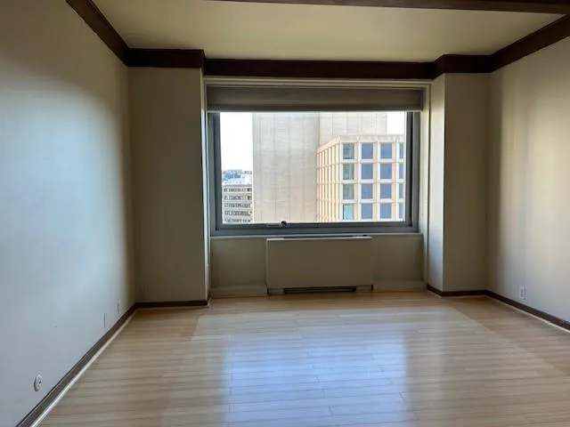 an empty room with windows