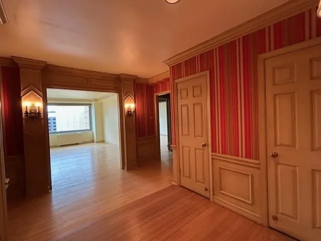 a view of a large window and a kitchen