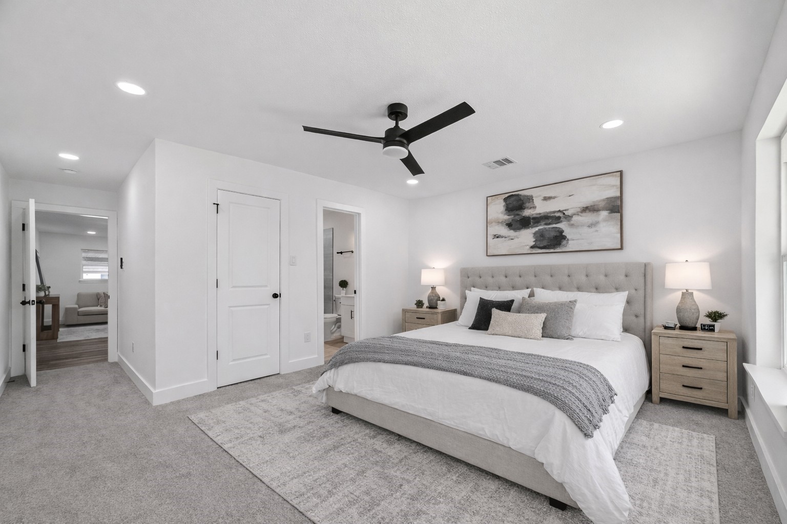 3112 Hays Street Pasadena, TX 77503 - Photo 11 of 22 a bedroom with a bed and a chandelier