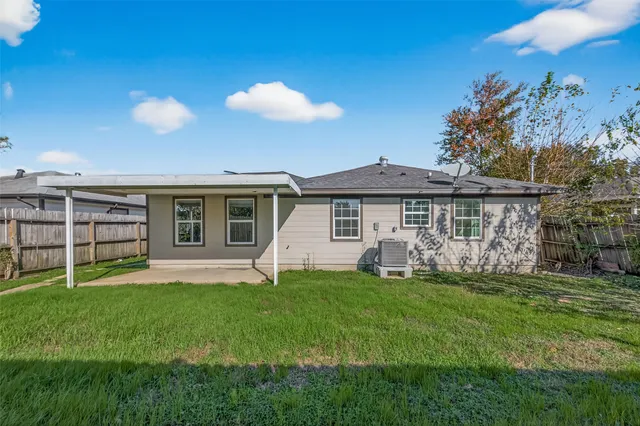 a front view of a house with a yard and porch