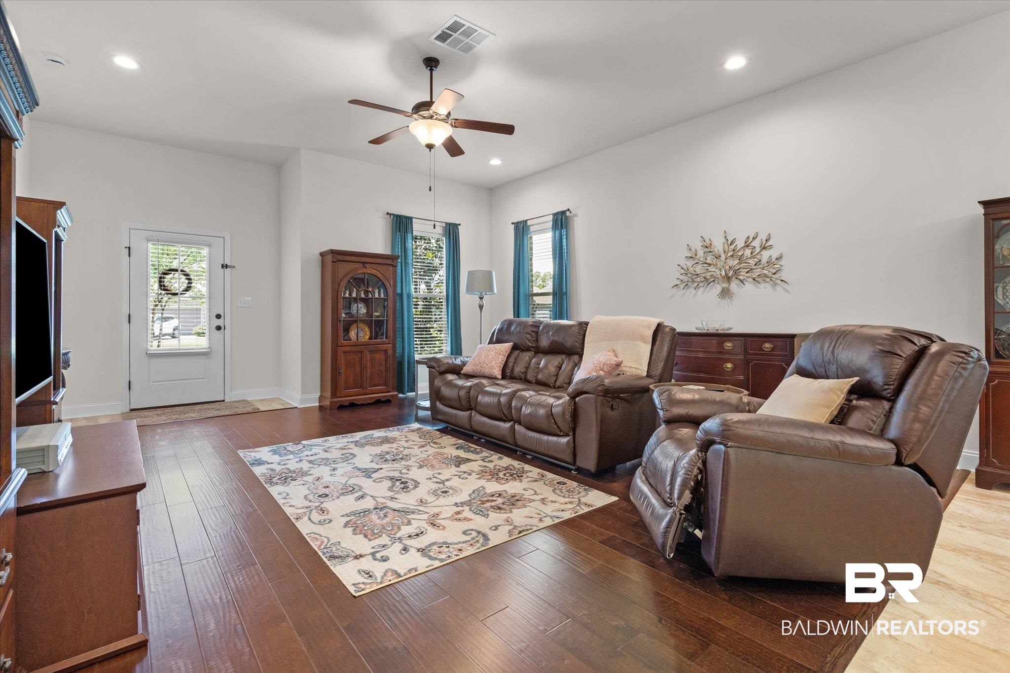 1270 Surrey Loop Foley, AL 36535 - Photo 4 of 27 Living area featuring dark wood-finish flooring, recessed lighting, and a ceiling fan