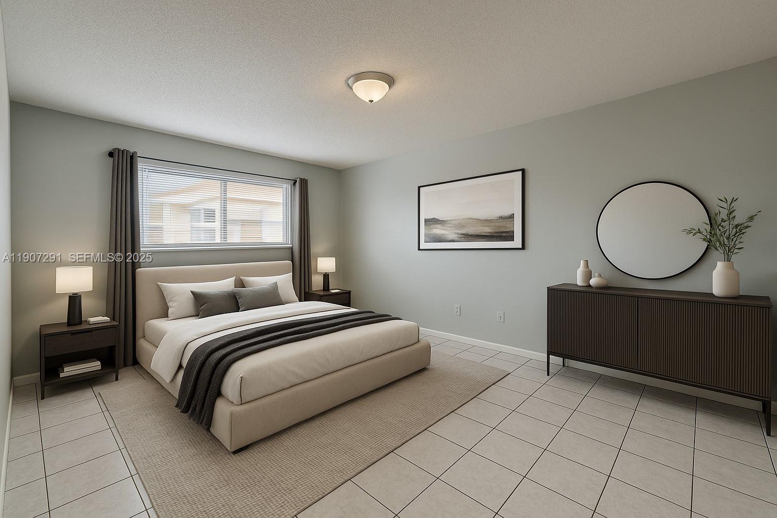 a bedroom with a bed mirror and window