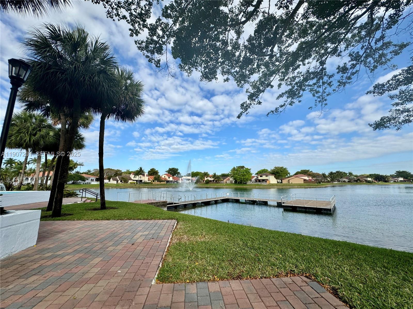 18250 Mediterranean Boulevard, Unit 1508 Hialeah, FL 33015 - Photo 20 of 26 a view of lake with houses