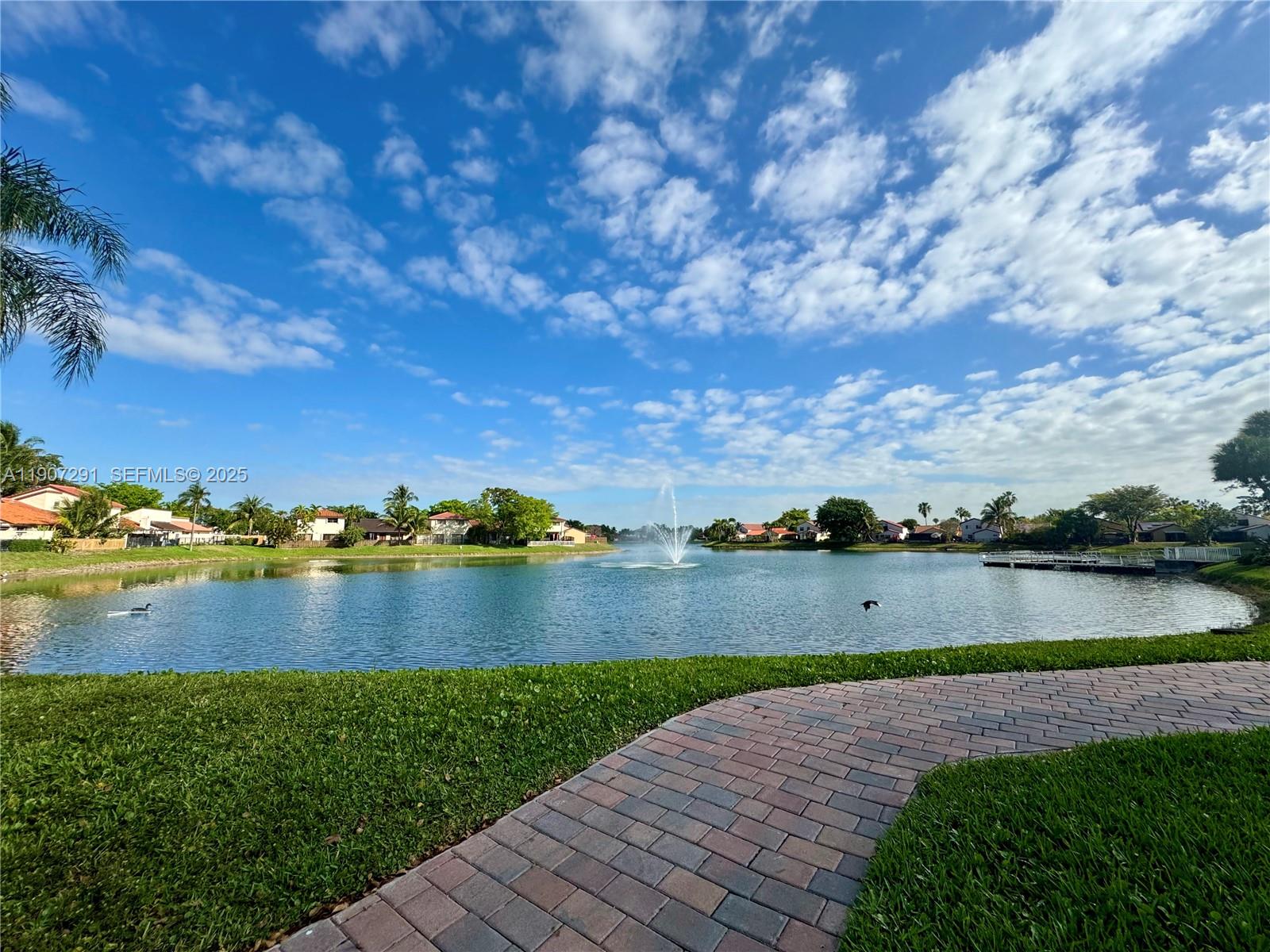 18250 Mediterranean Boulevard, Unit 1508 Hialeah, FL 33015 - Photo 9 of 26 a view of outdoor space and lake view