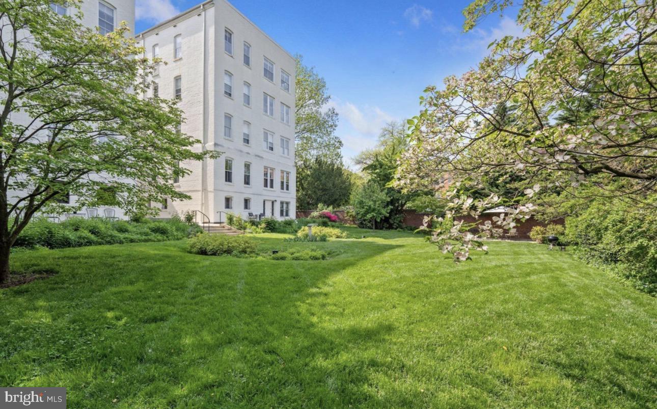 1657 31st Street Northwest, Unit 206 Washington, DC 20007 - Photo 26 of 26 a view of an apartment building and a yard
